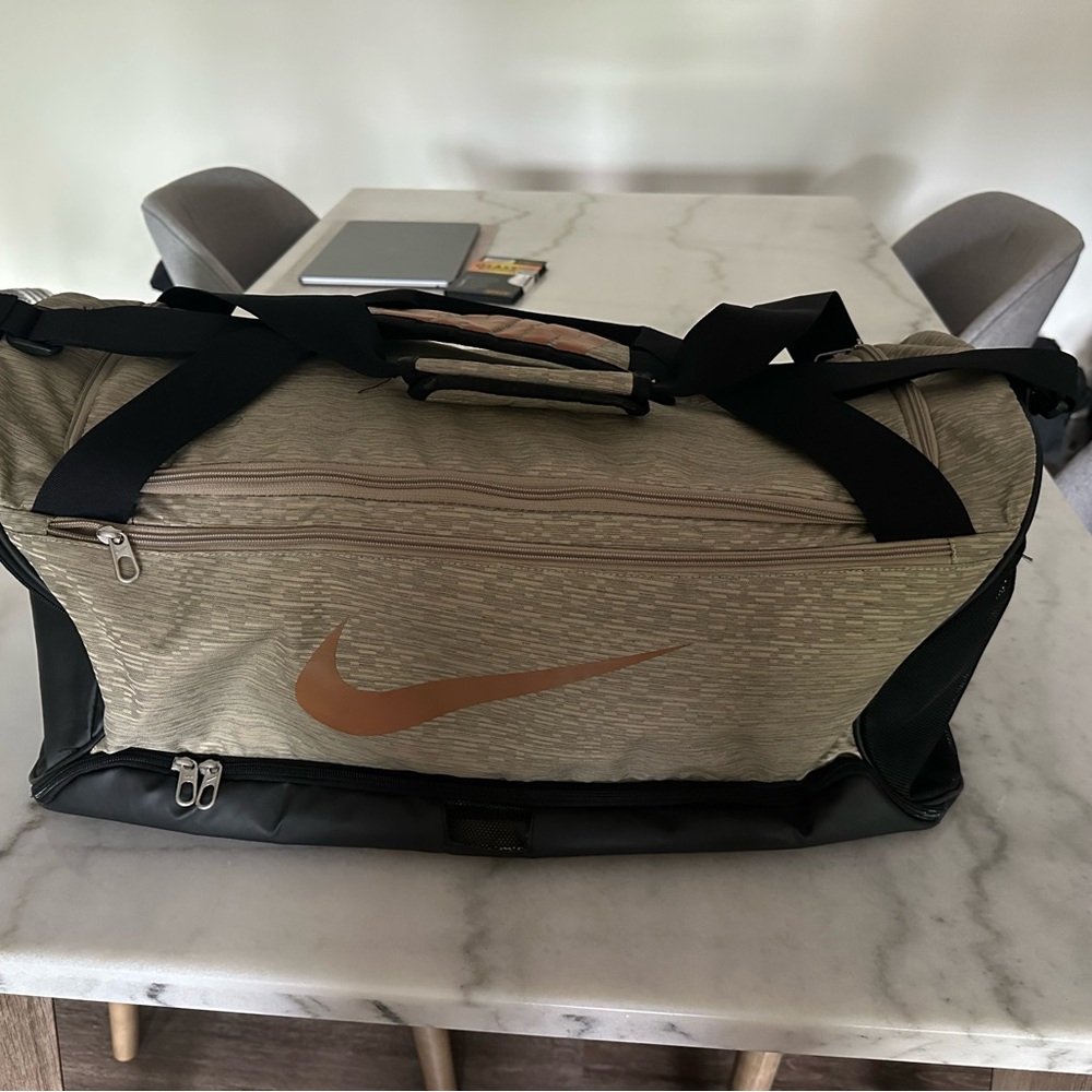 Nike Tan and Black Duffel Bag for Versatile Use